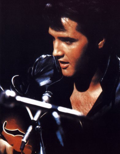 Elvis Presley pictures head shot dressed in black leather