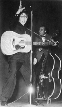 Elvis Presley picture on stage early days black suits