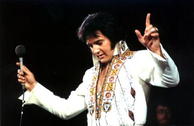 Elvis Onstage (courtesy of Jeff Schrembs Collection) Elvis Onstage (courtesy of Jeff Schrembs Collection)