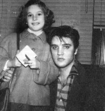 Elvis Presley picture with a young girl fan